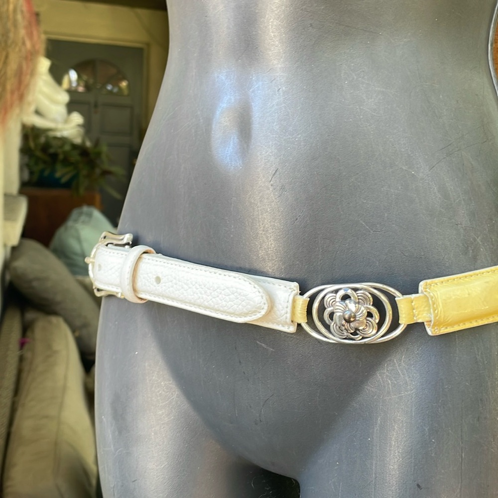 Brighton rosette , chain-link and patent leather belt
